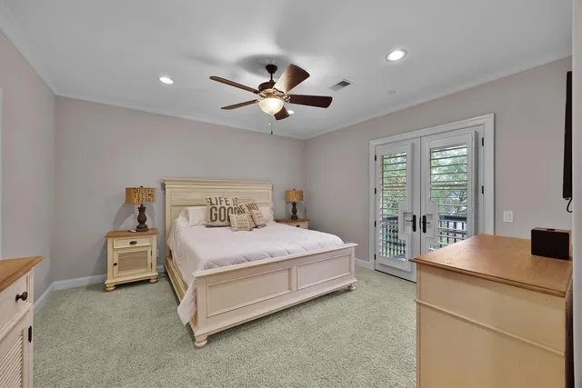 a bathroom with a granite countertop sink mirror vanity and toilet