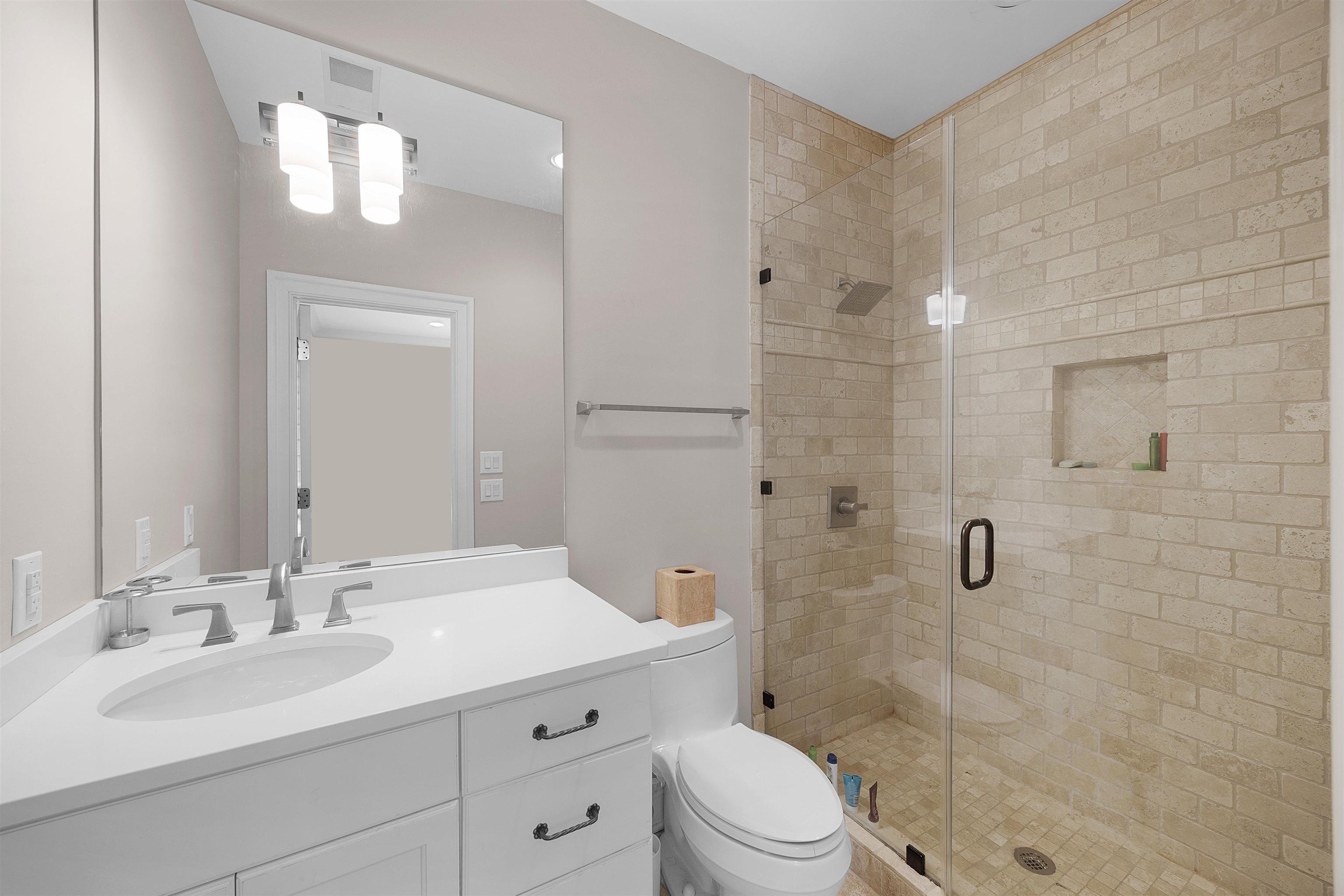 25 Caney Hollow Road Counce, TN 38326 - Photo 32 of 40 a bathroom with a sink a toilet and shower