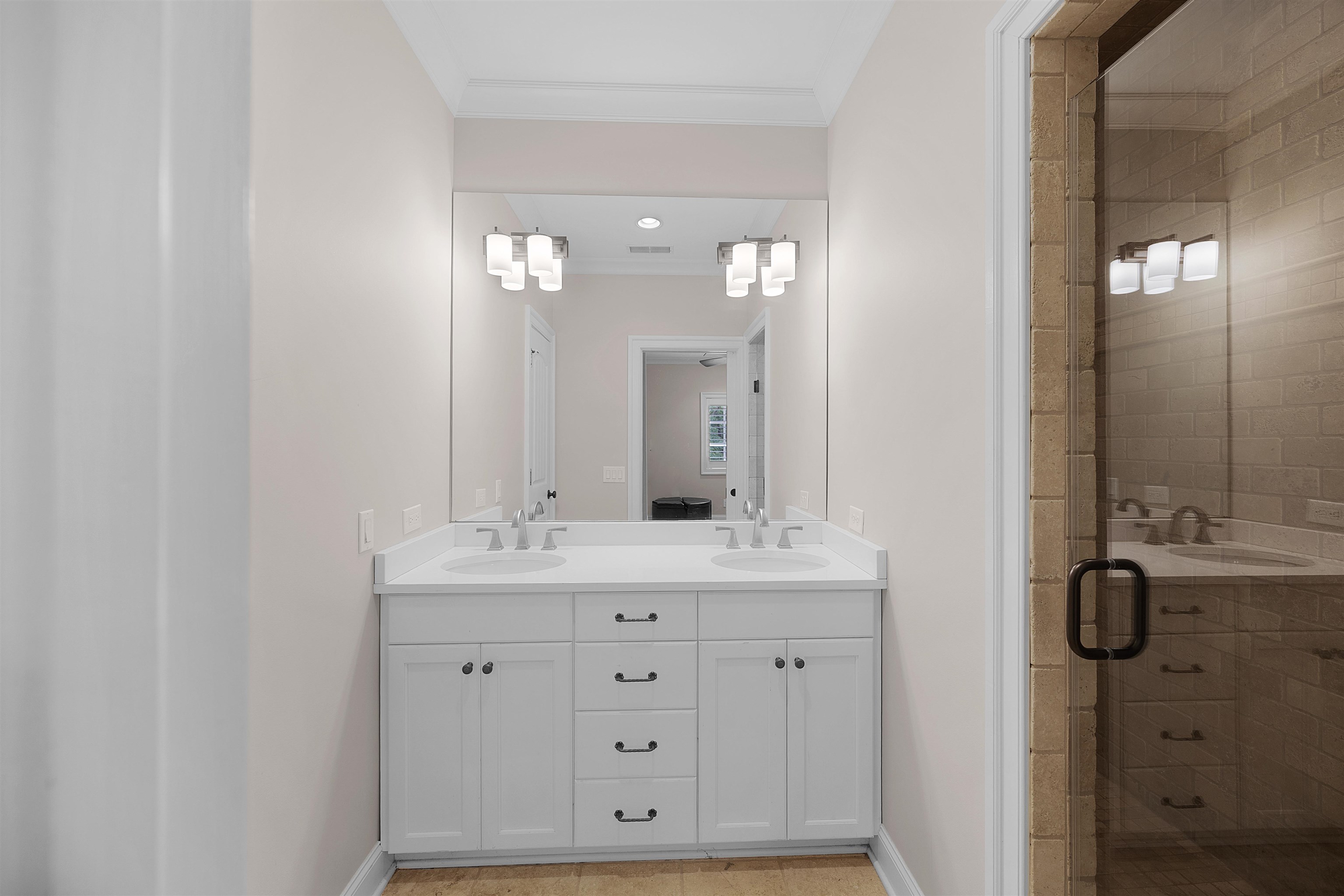 25 Caney Hollow Road Counce, TN 38326 - Photo 35 of 40 a bathroom with a granite countertop sink vanity and mirror