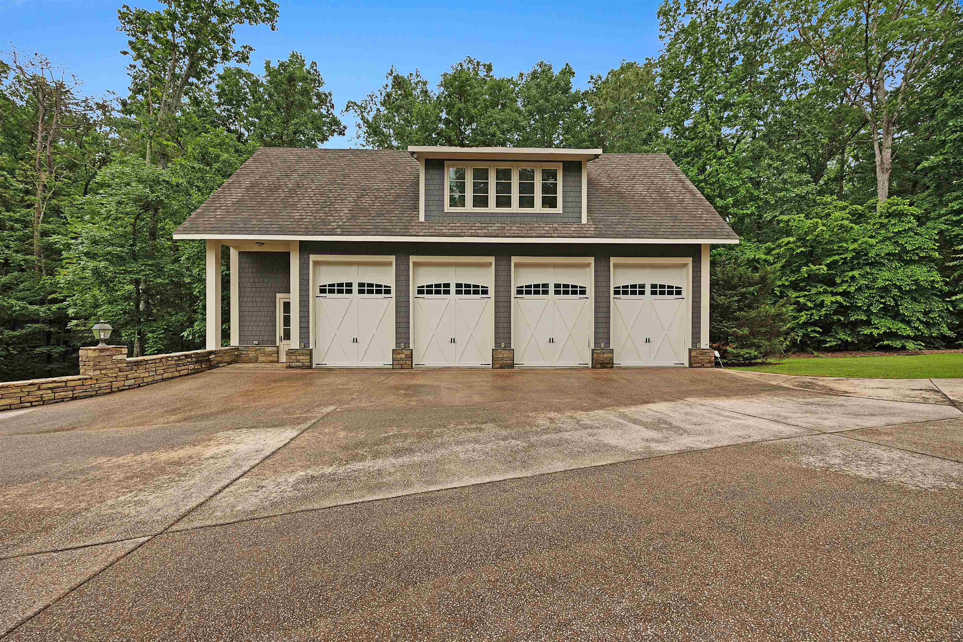 25 Caney Hollow Road Counce, TN 38326 - Photo 36 of 40 a front view of a house with a garden