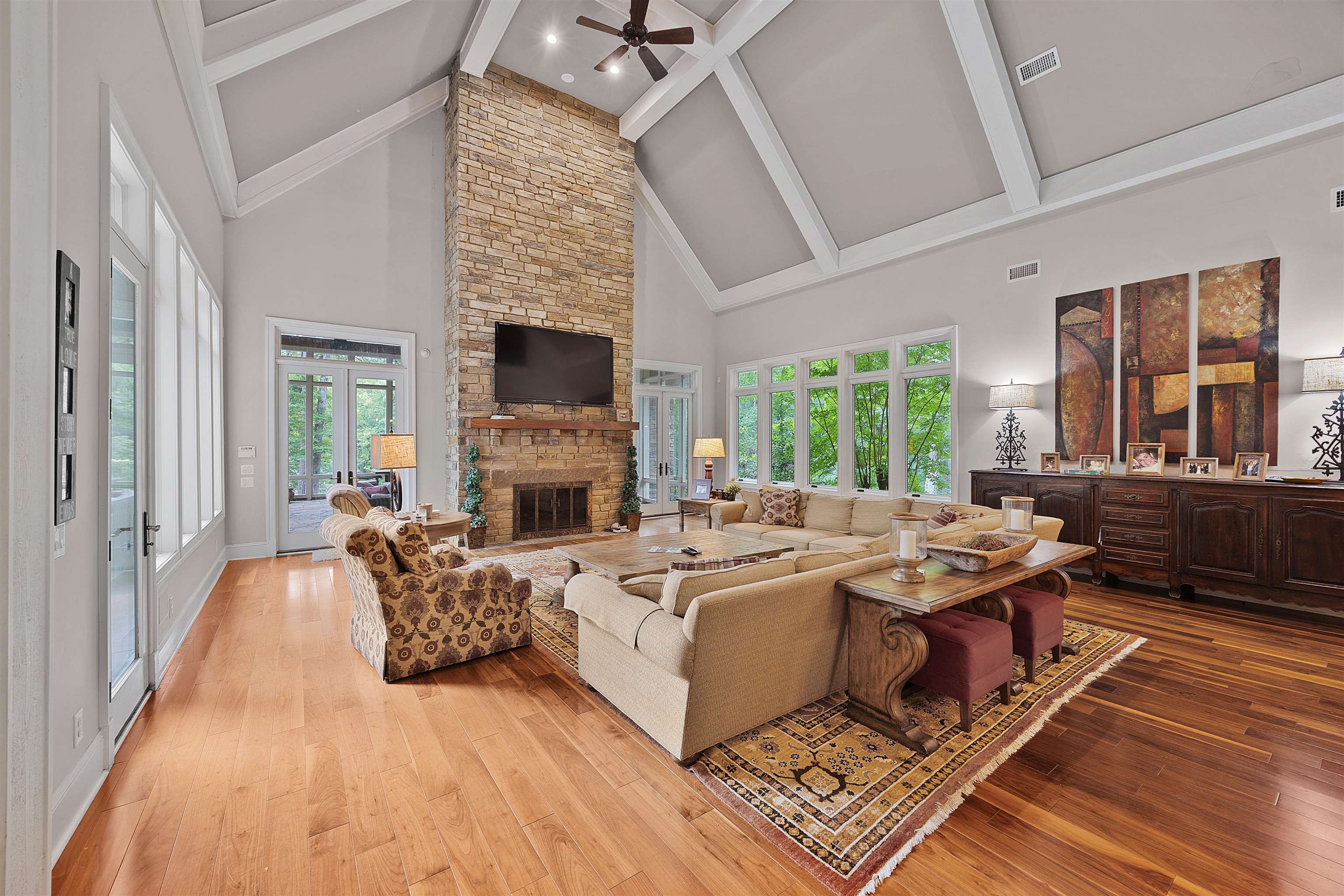 25 Caney Hollow Road Counce, TN 38326 - Photo 5 of 40 a living room with furniture a fireplace and a flat screen tv