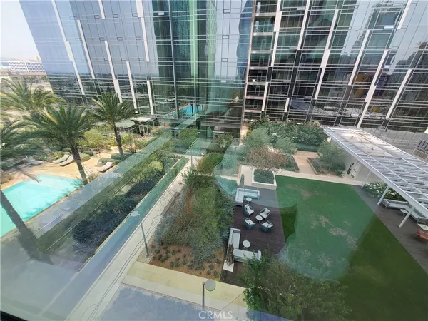 a house view with a garden space