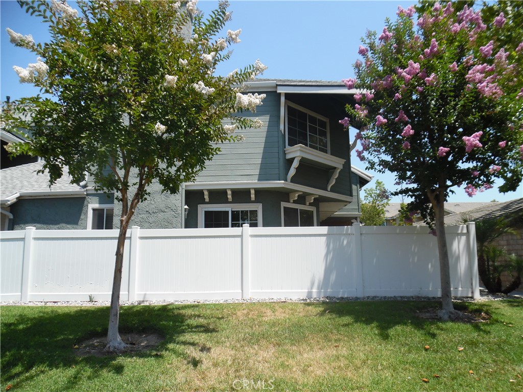 1806 Rory Lane, Unit 9 Simi Valley, CA 93063 - Photo 2 of 28 a view of a house with a yard