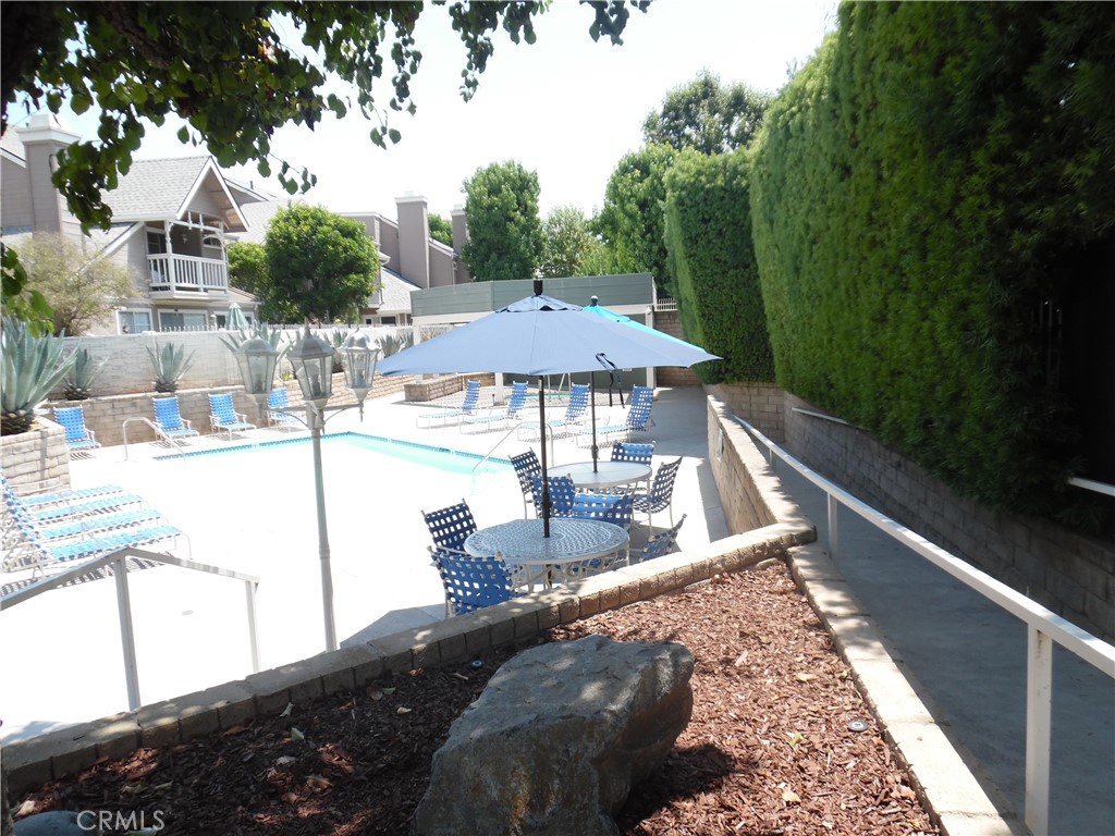 1806 Rory Lane, Unit 9 Simi Valley, CA 93063 - Photo 4 of 28 a view of a swimming pool with a patio