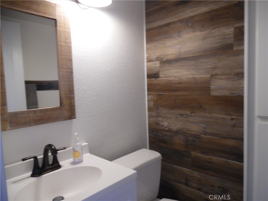 1806 Rory Lane, Unit 9 Simi Valley, CA 93063 - Photo 10 of 28 a bathroom with a sink and mirror