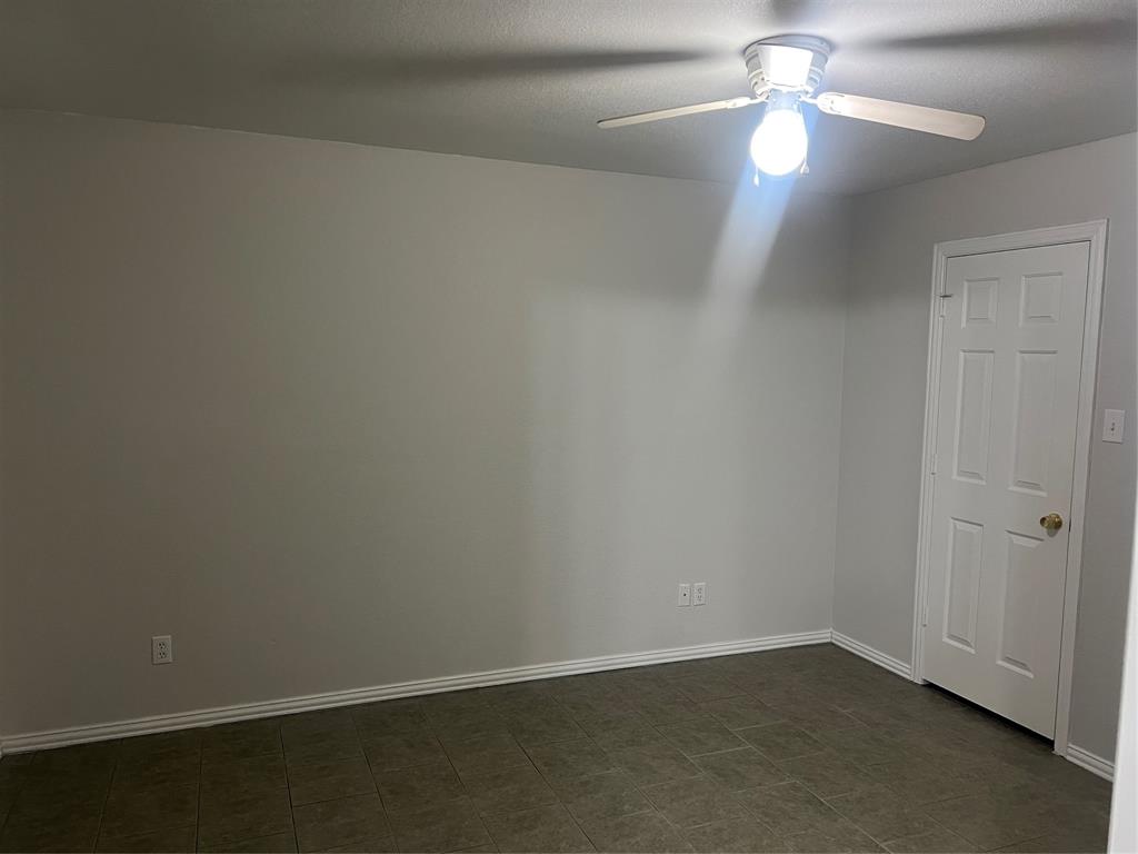 202 Blue Bell Court Weatherford, TX 76088 - Photo 13 of 17 2nd bedroom with ceiling fan