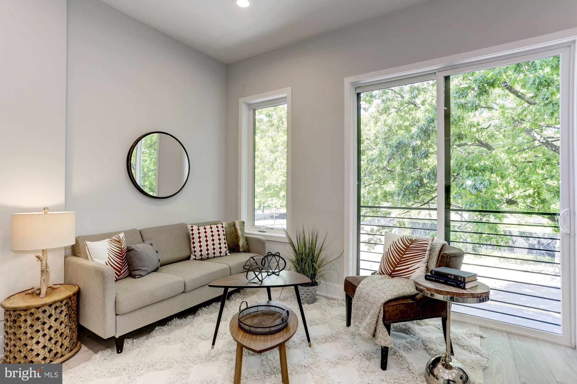 7129 Georgia Avenue Northwest, Unit 4 Washington, DC 20012 - Photo 2 of 10 Lots of light in the living room