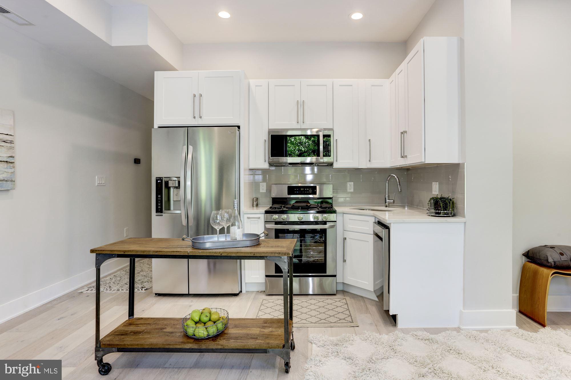 7129 Georgia Avenue Northwest, Unit 4 Washington, DC 20012 - Photo 3 of 10 Perfect new kitchen
