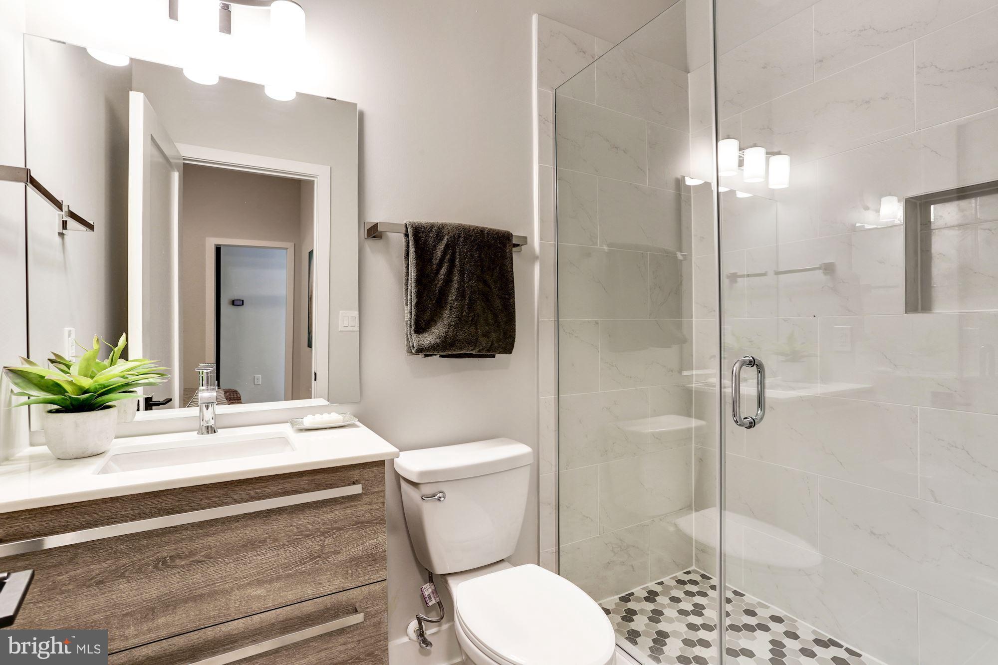 7129 Georgia Avenue Northwest, Unit 4 Washington, DC 20012 - Photo 8 of 10 gorgeous new full bath