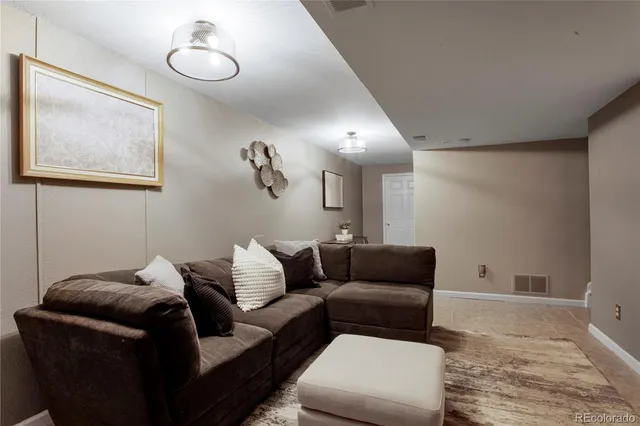 a living room with furniture and a couch