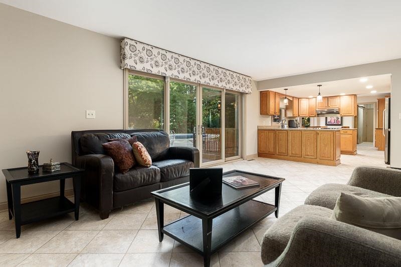 1753 Madron Road Rockford, IL 61107 - Photo 11 of 46 a living room with furniture and a large window