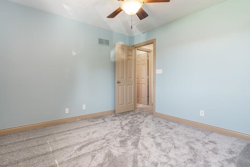 1753 Madron Road Rockford, IL 61107 - Photo 25 of 46 wooden floor in an empty room