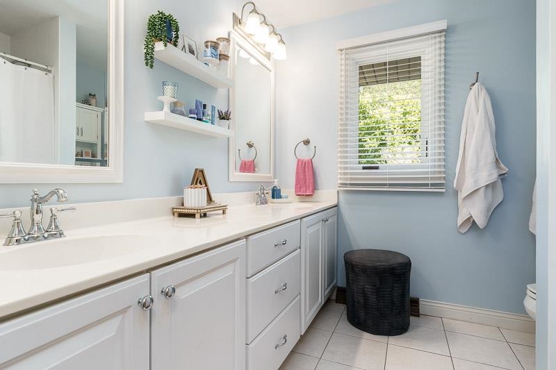 1753 Madron Road Rockford, IL 61107 - Photo 26 of 46 a kitchen with a sink cabinets and window