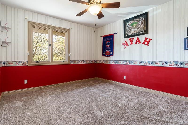 1753 Madron Road Rockford, IL 61107 - Photo 27 of 46 a view of an empty room with window and cabinet