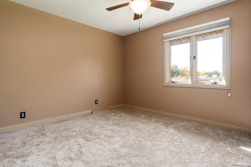 1753 Madron Road Rockford, IL 61107 - Photo 30 of 46 an empty room with a window