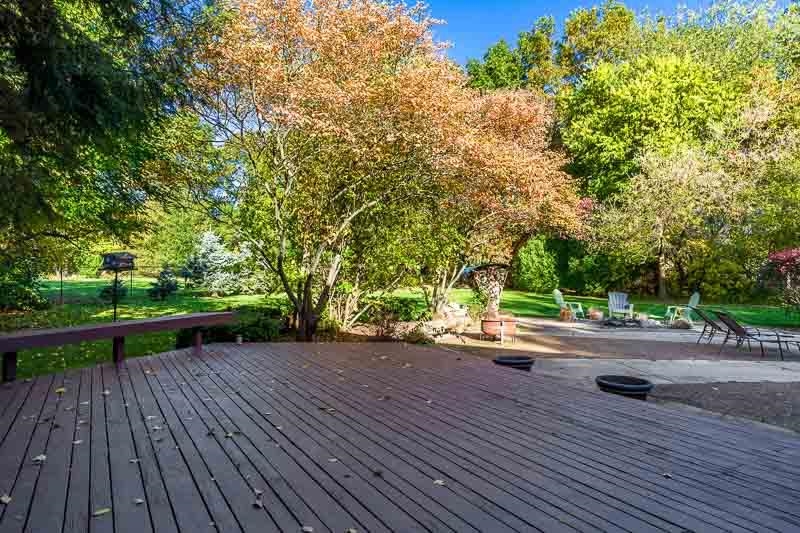 1753 Madron Road Rockford, IL 61107 - Photo 40 of 46 a wooden bench sitting on top of a wooden floor