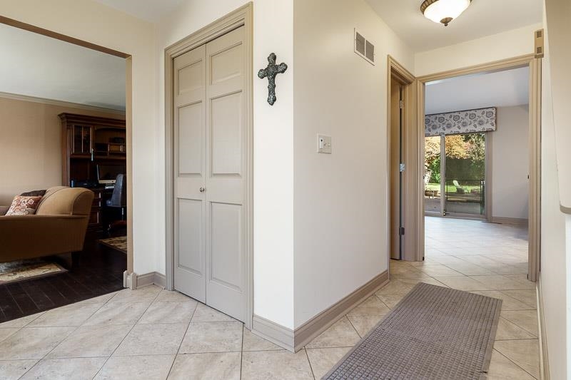 1753 Madron Road Rockford, IL 61107 - Photo 4 of 46 a view of a hallway with furniture and windows