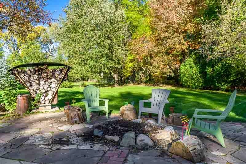 1753 Madron Road Rockford, IL 61107 - Photo 41 of 46 a view of a table and chairs in backyard