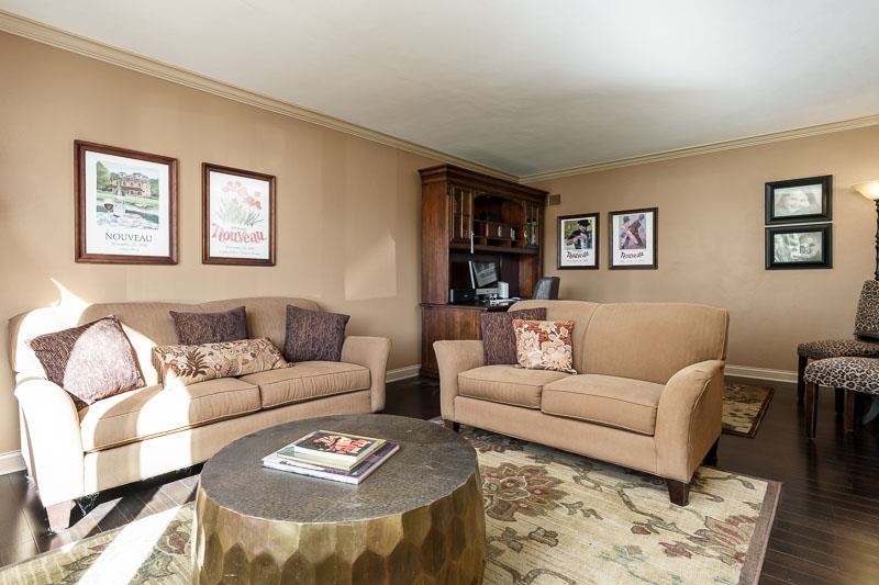 1753 Madron Road Rockford, IL 61107 - Photo 7 of 46 a living room with furniture and painting on the wall
