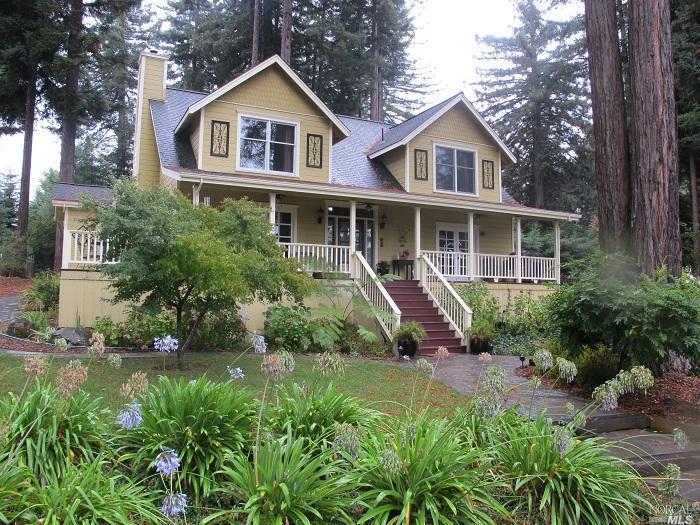 11392 Peaks Pike Road Sebastopol, CA 95472 - Photo 1 of 1 a front view of a house with a yard and potted plants