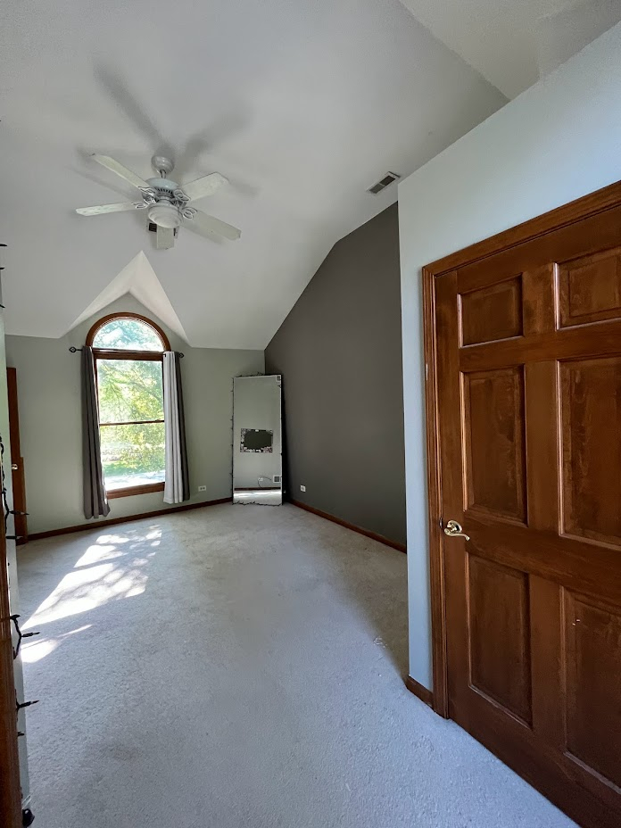 923 Parkside Road Naperville, IL 60540 - Photo 24 of 25 an empty room with windows and closet