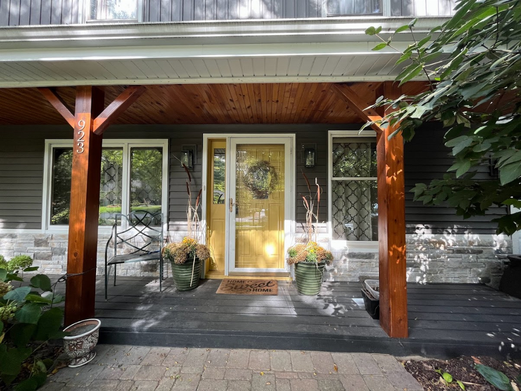 923 Parkside Road Naperville, IL 60540 - Photo 5 of 25 a front view of a house with outdoor seating