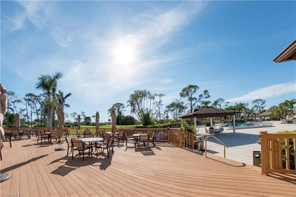162 Teryl Road, Unit 62 Naples, FL 34112 - Photo 12 of 13 a view of a terrace with seating space
