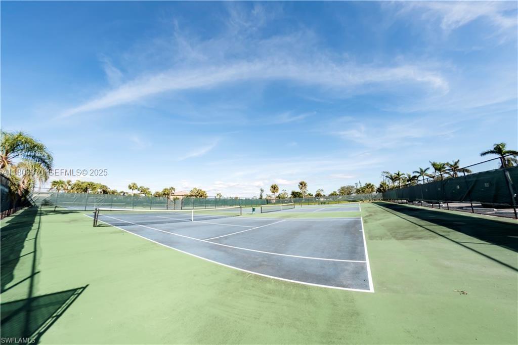 162 Teryl Road, Unit 62 Naples, FL 34112 - Photo 13 of 13 a view of a tennis court