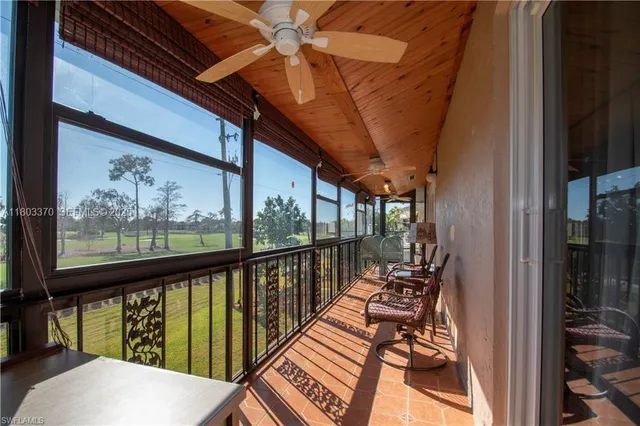 a view of balcony with furniture