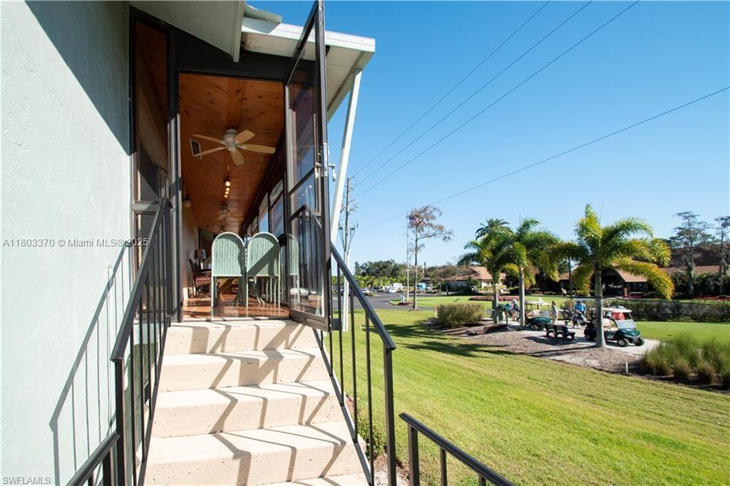 162 Teryl Road, Unit 62 Naples, FL 34112 - Photo 9 of 13 a view of swimming pool from a balcony