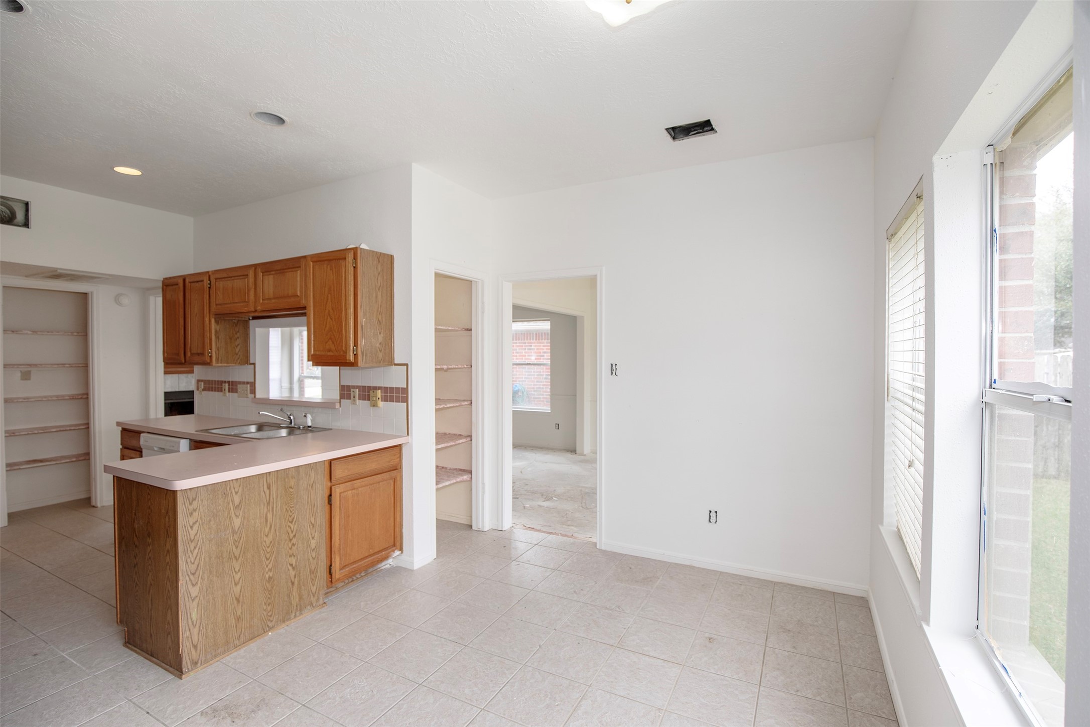 1627 Mabry Mill Road Houston, TX 77062 - Photo 13 of 32 a large kitchen with a stove and a sink