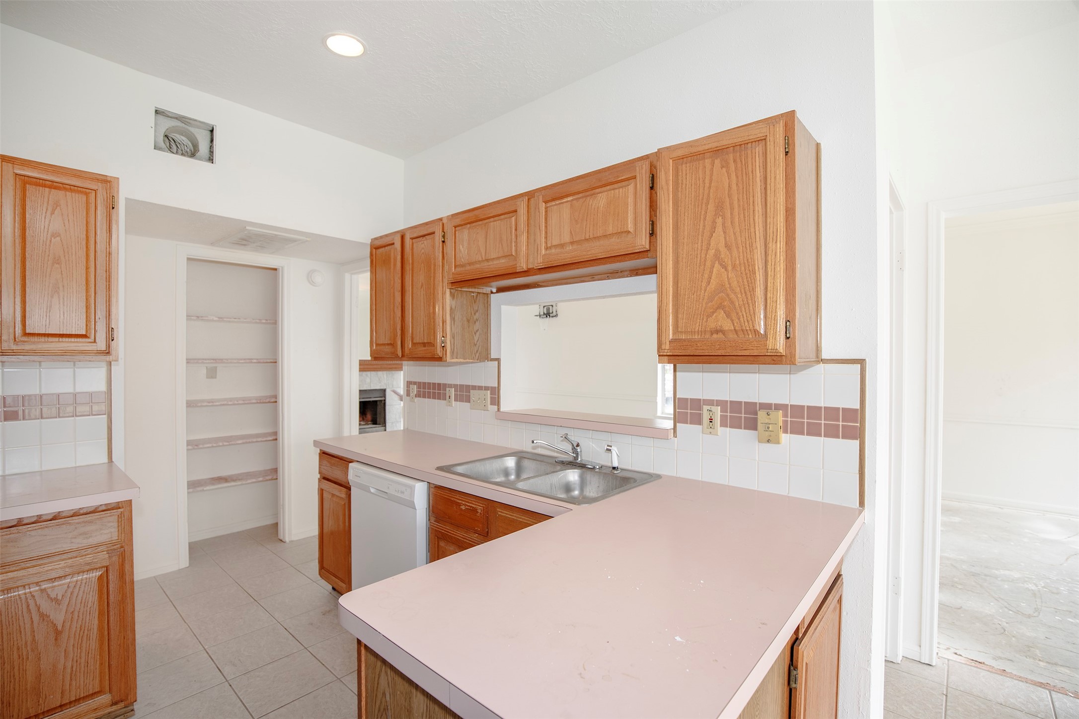 1627 Mabry Mill Road Houston, TX 77062 - Photo 16 of 32 a kitchen that has a sink and a stove in it
