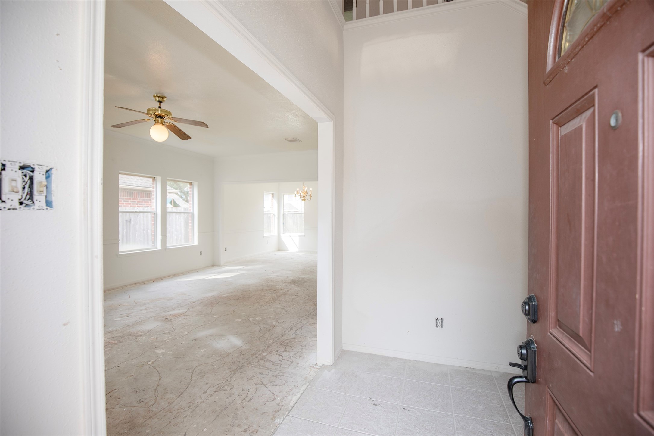 1627 Mabry Mill Road Houston, TX 77062 - Photo 2 of 32 an empty room with windows and fan