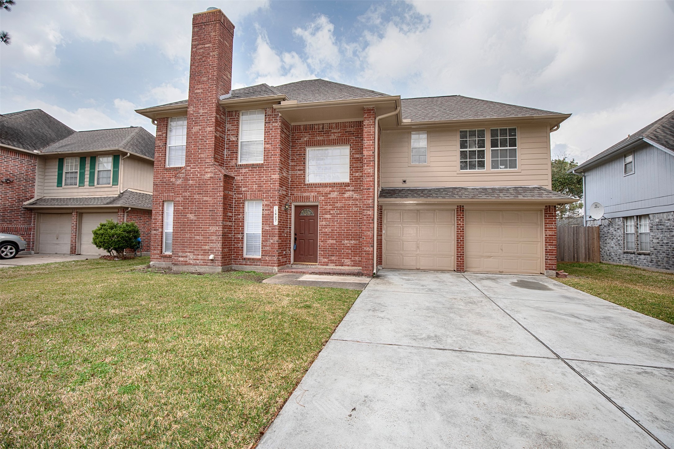 1627 Mabry Mill Road Houston, TX 77062 - Photo 32 of 32 a front view of a house with garden
