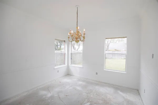 a view of an empty room with window