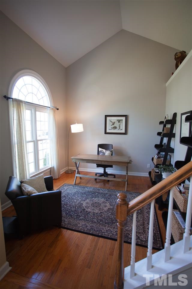 8820 Braceridge Road Raleigh, NC 27613 - Photo 4 of 22 a living room with furniture and a large window