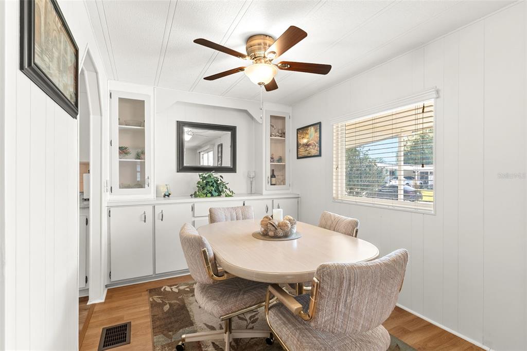1610 Reynolds Road, Unit 98 Lakeland, FL 33801 - Photo 14 of 36 a dining room with furniture and window