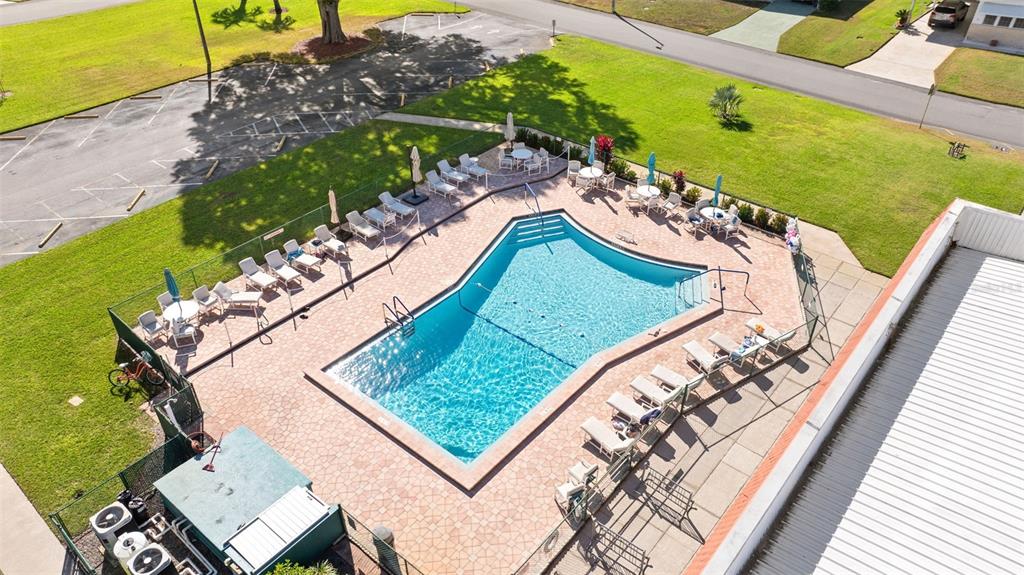 1610 Reynolds Road, Unit 98 Lakeland, FL 33801 - Photo 35 of 36 a view of a pool with a yard