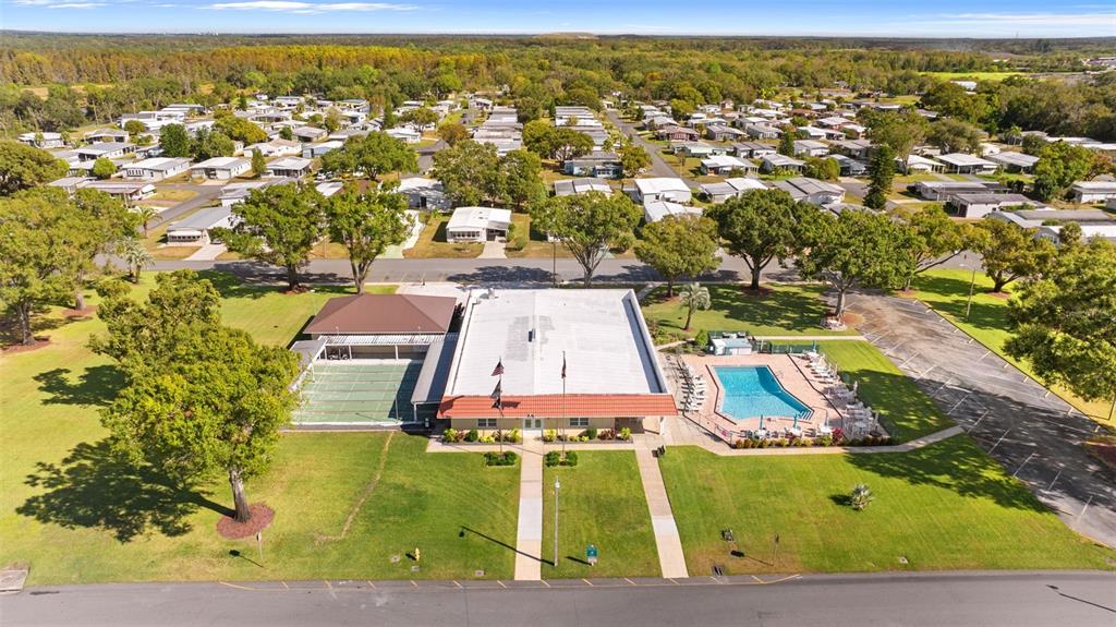 1610 Reynolds Road, Unit 98 Lakeland, FL 33801 - Photo 36 of 36 an aerial view of residential houses with outdoor space