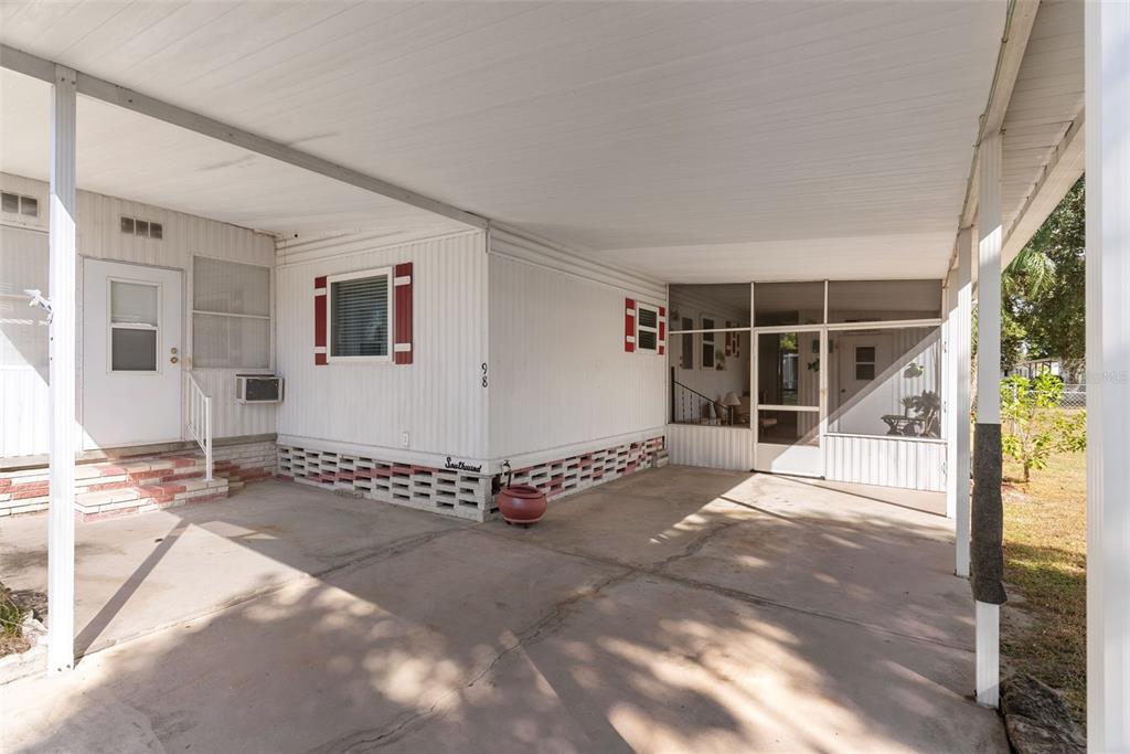 1610 Reynolds Road, Unit 98 Lakeland, FL 33801 - Photo 4 of 36 a view of a house with a outdoor space