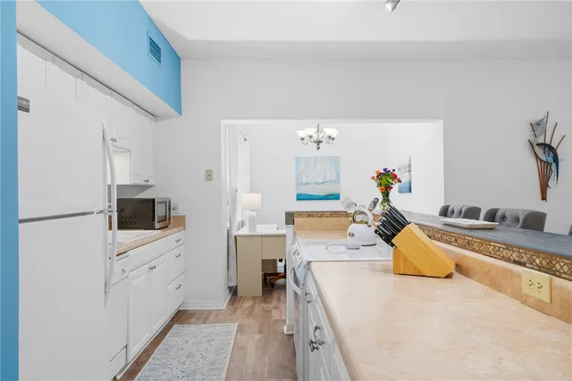 $355,000 | 1215 Winding Oaks Circle East, Unit 403, Vero Beach, FL 32963