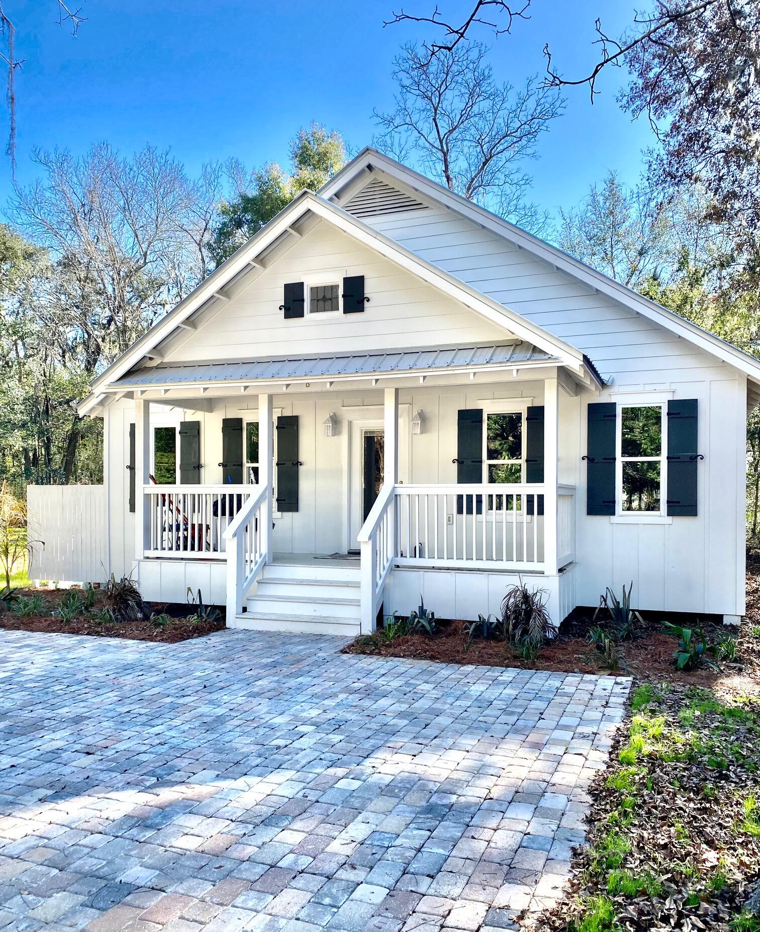 8 Sally Lane Santa Rosa Beach, FL 32459 - Photo 1 of 17 a front view of a house with a yard