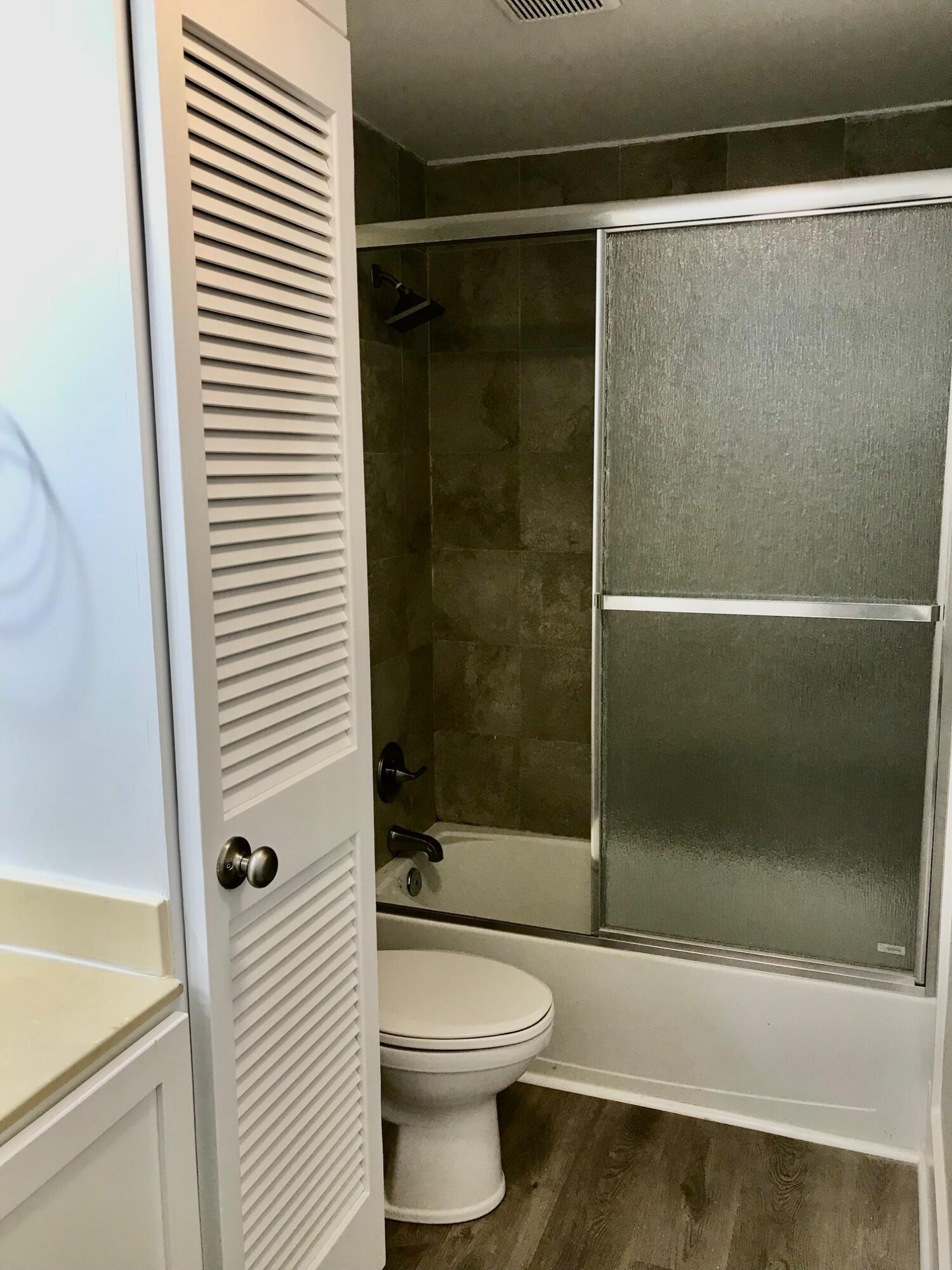 8 Sally Lane Santa Rosa Beach, FL 32459 - Photo 12 of 17 a bathroom with a shower and a toilet