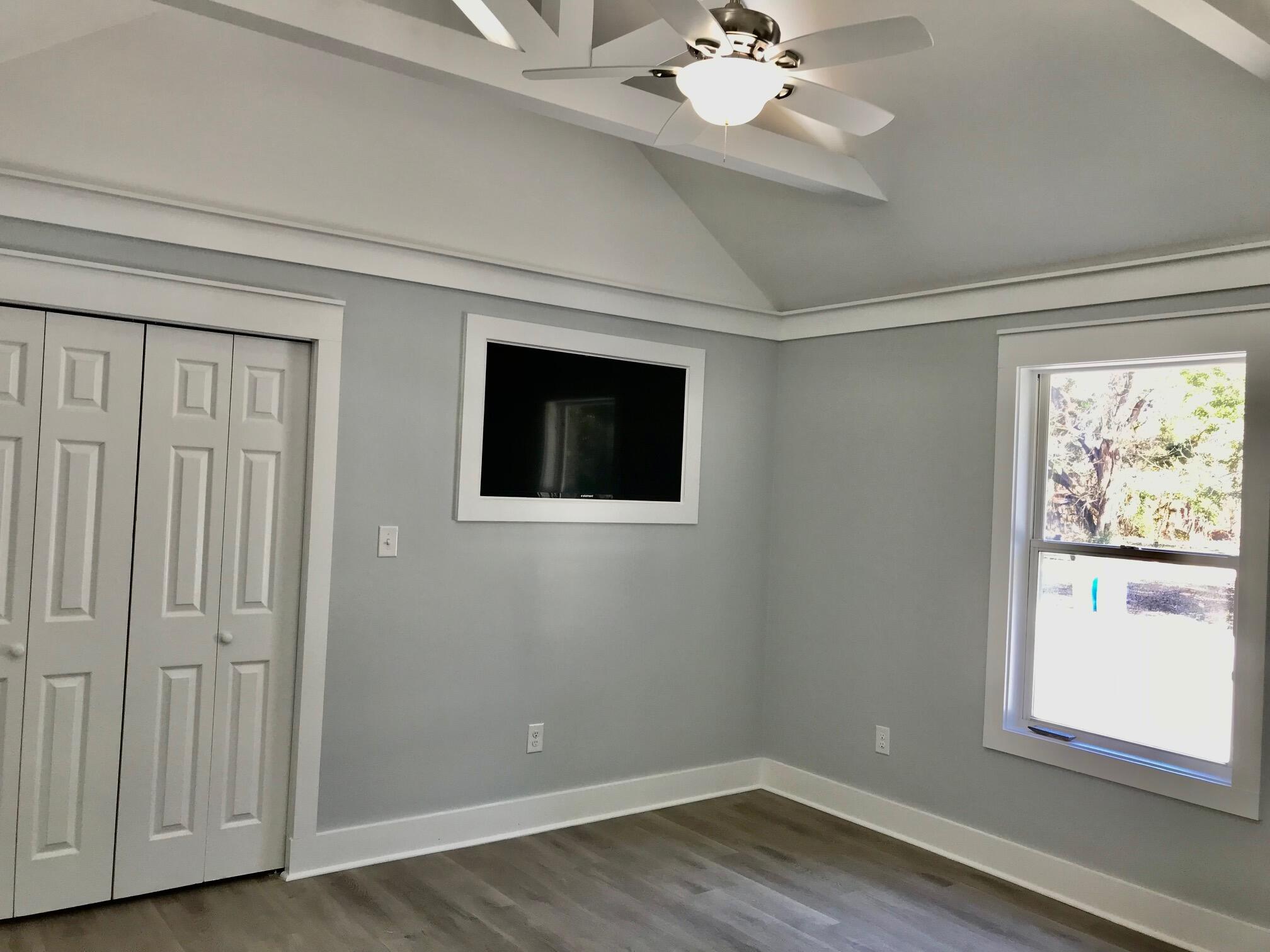 8 Sally Lane Santa Rosa Beach, FL 32459 - Photo 16 of 17 wooden floor in an empty room with a window