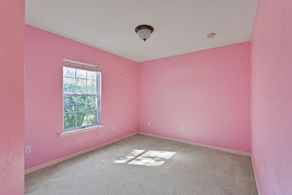 9590 Southwest 98th Avenue Gainesville, FL 32608 - Photo 12 of 25 a view of empty room with window