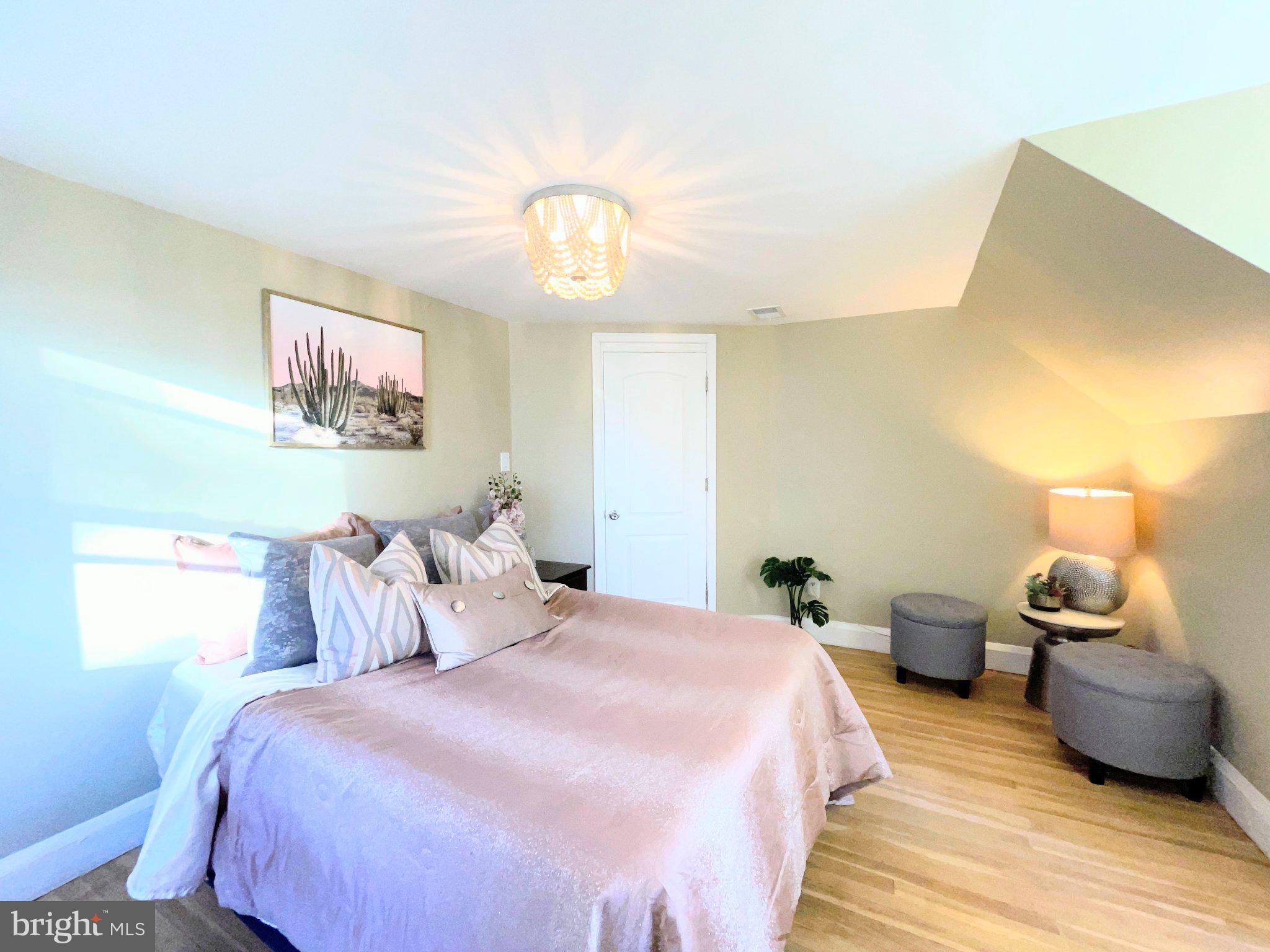 3712 West Cold Spring Lane Baltimore, MD 21215 - Photo 34 of 39 Serene bedroom with natural light.