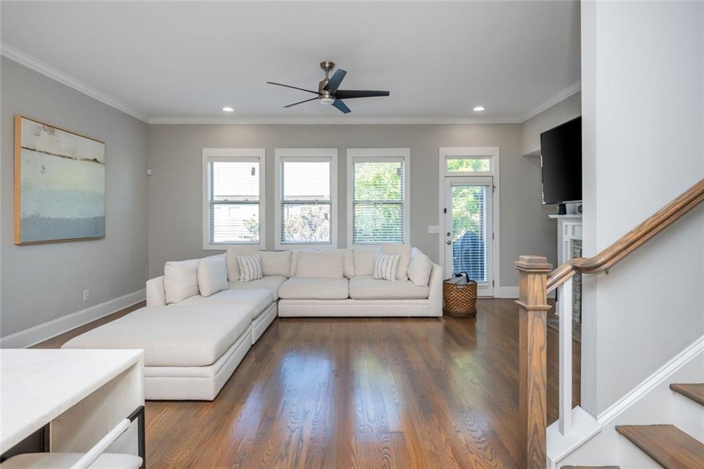 2138 Shale Lane Northwest, Unit 260 Atlanta, GA 30318 - Photo 18 of 39 a living room with furniture and a large window