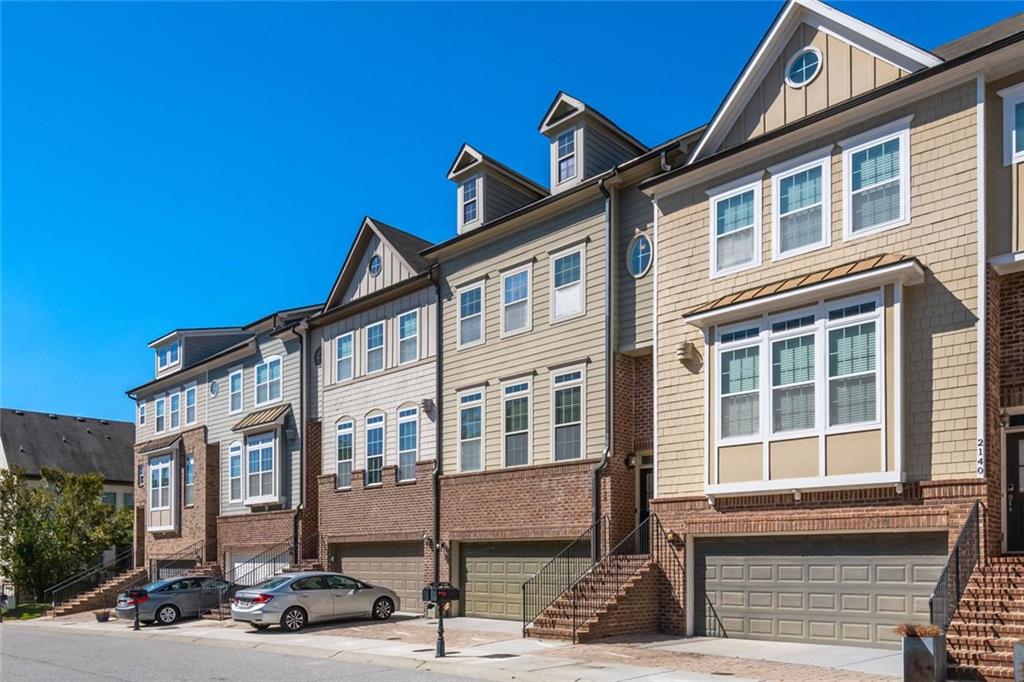 2138 Shale Lane Northwest, Unit 260 Atlanta, GA 30318 - Photo 2 of 39 a front view of a building with street view
