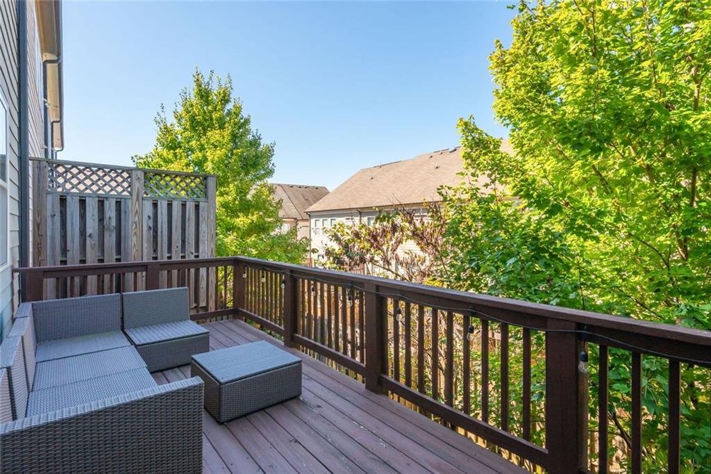 2138 Shale Lane Northwest, Unit 260 Atlanta, GA 30318 - Photo 21 of 39 a view of a balcony with wooden floor