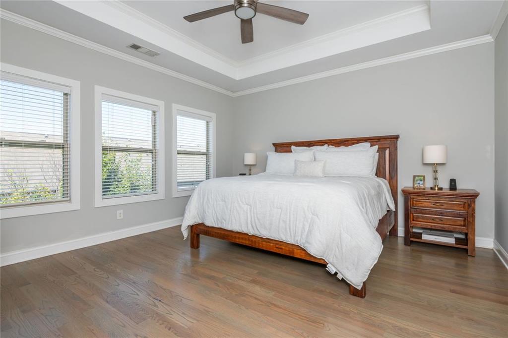 2138 Shale Lane Northwest, Unit 260 Atlanta, GA 30318 - Photo 23 of 39 a bedroom with a bed and a window